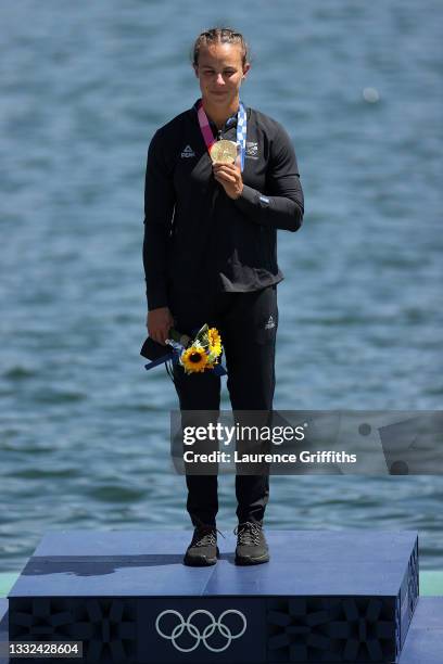 Gold medalist Lisa Carrington of Team New Zealand celebrates at the medal ceremony following the Women's Kayak Single 500m Final A on day thirteen of...