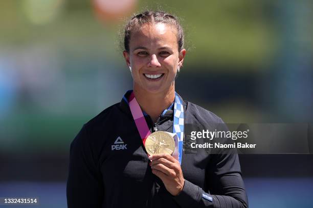 Gold medalist Lisa Carrington of Team New Zealand celebrates at the medal ceremony following the Women's Kayak Single 500m Final A on day thirteen of...