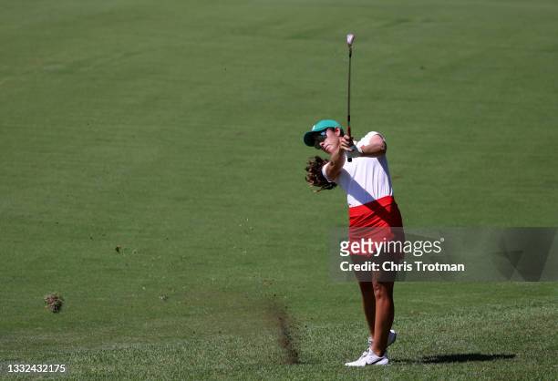 Maria Fassi of Team Mexico plays an approach shot on the 17th hole during the second round of the Women's Individual Stroke Play on day thirteen of...