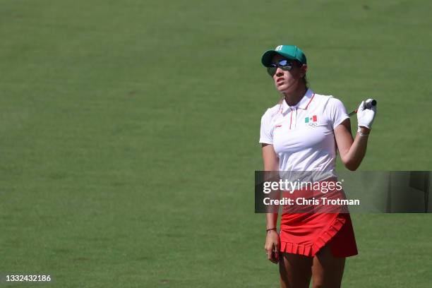 Maria Fassi of Team Mexico reacts to an approach shot on the 17th hole during the second round of the Women's Individual Stroke Play on day thirteen...