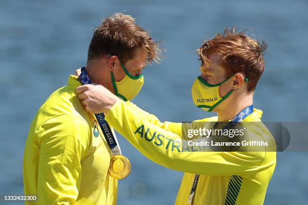 Gold medalists Jean van der Westhuyzen and Thomas Green of Team Australia celebrate at the medal ceremony following the Men's Kayak Double 1000m...