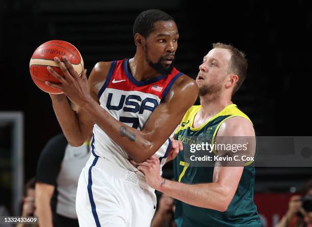 Kevin Durant of Team United States drives to the basket against Joe Ingles of Team Australia during the second half of a Men's Basketball...