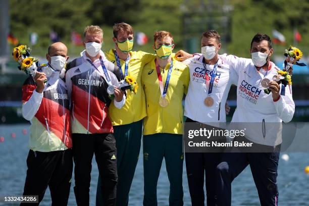 Silver medalist Max Hoff and Jacob Schopf of Team Germany, gold medalists Jean van der Westhuyzen and Thomas Green of Team Australia and bronze...