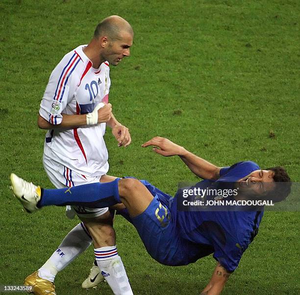 French midfielder Zinedine Zidane gestures after head butting Italian defender Marco Materazzi during the World Cup 2006 final football match between...