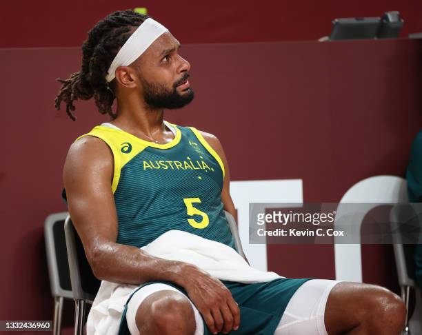 Patty Mills of Team Australia reacts in disappointment during the second half of a Men's Basketball quarterfinals game between Team United States and...
