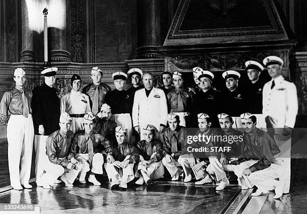 Duce Benito Mussolini poses with the Italian national soccer team 01 July 1938 during a reception at the Palazzo Venezia in Rome. Italy, winner of...