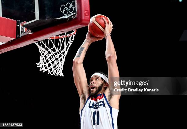 Javale McGee of the USA slam dunks during the Basketball semi final match between Australia and the USA on day thirteen of the Tokyo 2020 Olympic...