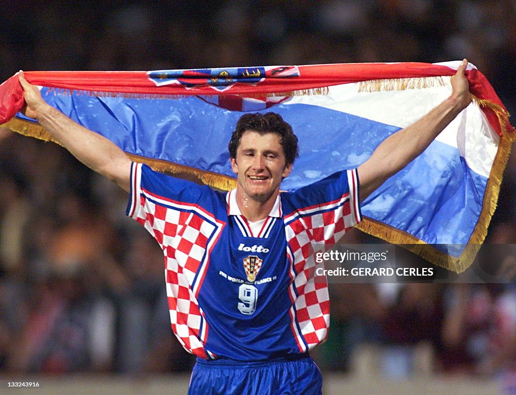 Croatian forward Davor Suker waves his n