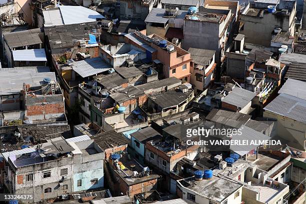 By Fabian WERNER - Picture taken on June 14, 2010 of the "Morro da Providencia" favela , in Rio de Janeiro. Brazil is experiencing a construction...