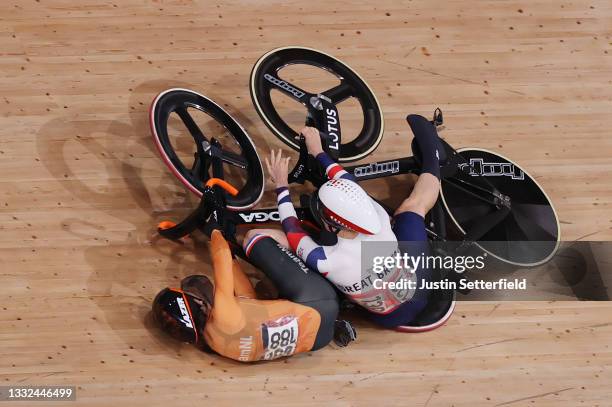 Laurine van Riessen of Team Netherlands and Katy Marchant of Team Great Britain fall during the Women's Keirin quarterfinals - heat 1 of the track...