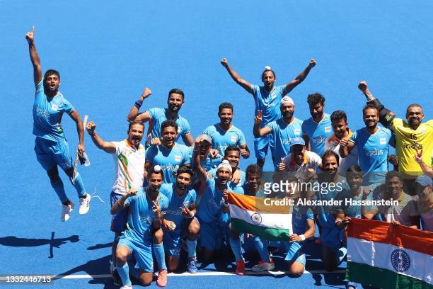 Varun Kumar of Team India reacts with the team after winning the Men's Bronze medal match between Germany and India on day thirteen of the Tokyo 2020...