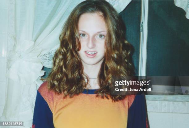 90s teen, 90s teenager with dental braces and curly hair - fashion archive stock-fotos und bilder