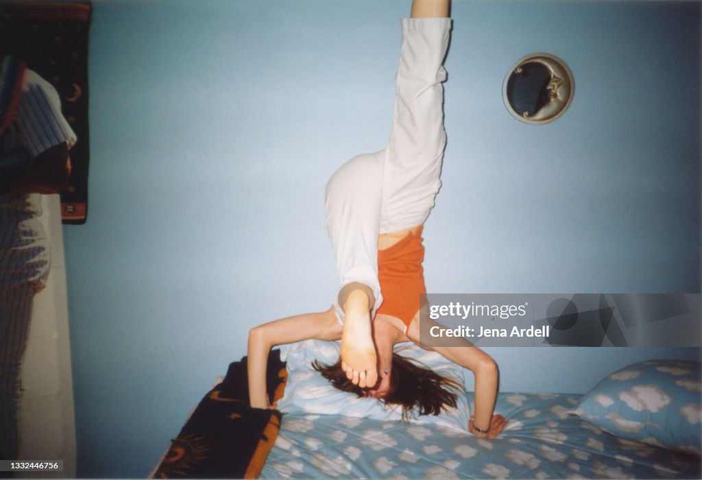1990s Teenager Having Fun, Young Girl Doing Headstand