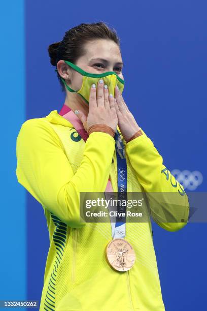 Bronze medalist Melissa Wu of Team Australia celebrates during the medal ceremony for the Women's 10m Platform Final on day thirteen of the Tokyo...