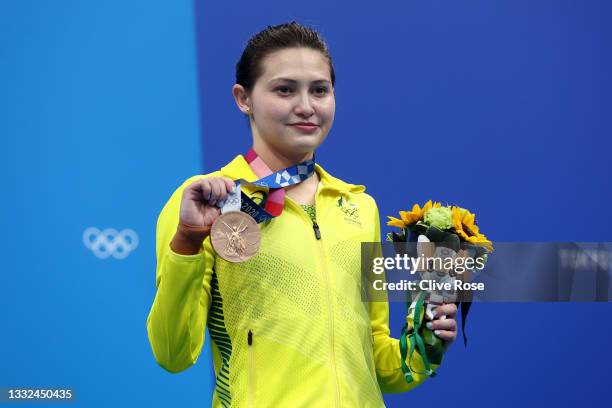 Bronze Medalist Melissa Wu of Team Australia celebrates during the medal ceremony for the Women's 10m Platform Final on day thirteen of the Tokyo...