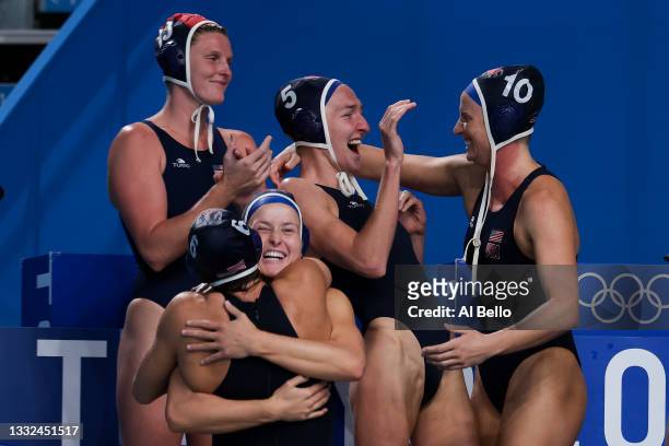 To R, Amanda Longan, Margaret Steffens, Stephanie Haralabidis, Paige Hauschild and Kaleigh Gilchrist of Team United States celebrate the win during...