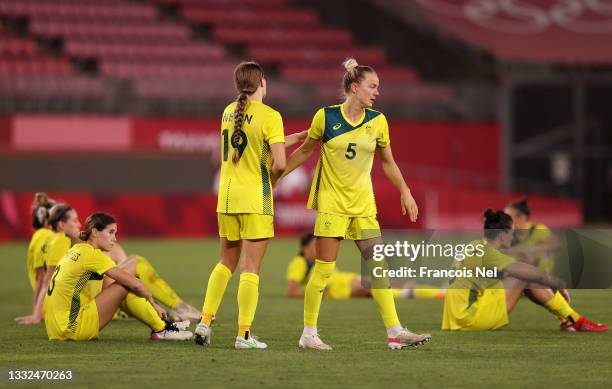 Aivi Luik of Team Australia is consoled by team mate Courtney Nevin following defeat in the Women's Bronze Medal match between United States and...