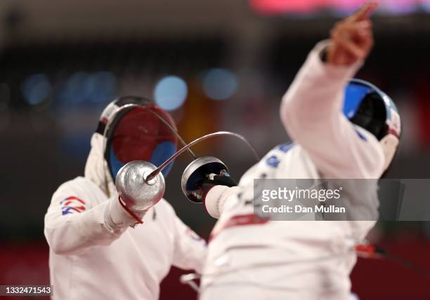 Woongtae Jun of Team South Korea and Sergio Villamayor of Team Argentina compete during the Fencing Ranked Round of the Men's Modern Pentathlon on...