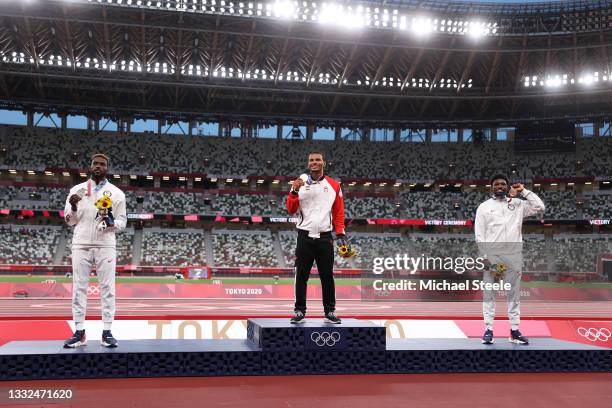 Silver medalist Kenneth Bednarek of Team United States, gold medalist Andre De Grasse of Team Canada and bronze medalist Noah Lyles of Team United...