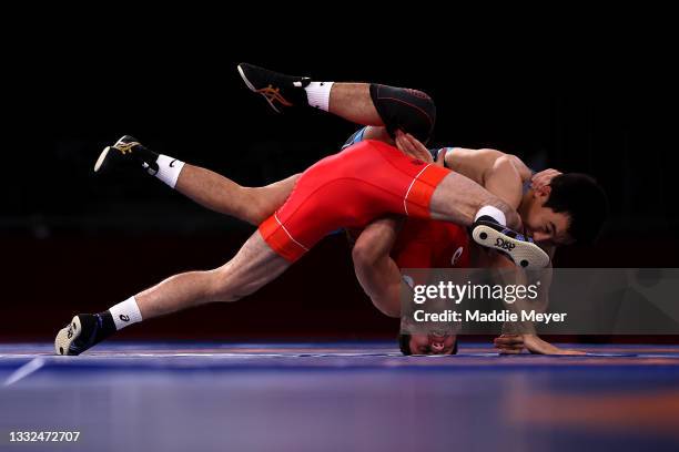 Zaurbek Sidakov of Team ROC competes against Daniyar Kaisanov of Team Kazakhstan during the Men's Freestyle 74kg Semifinal on day thirteen of the...