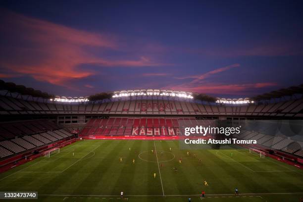 General view of play as the sun sets during the Women's Bronze Medal match between United States and Australia on day thirteen of the Tokyo 2020...