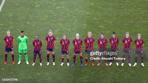Players of Team United States stand for the national anthem prior to the Women's Bronze Medal match between United States and Australia on day...