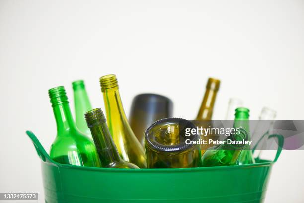 recycling glass bottles - after party garbage stock pictures, royalty-free photos & images