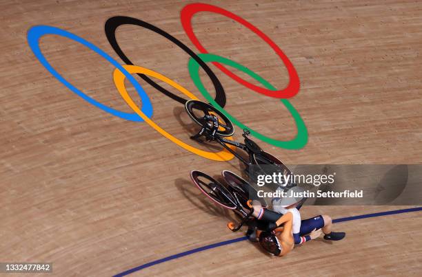 Laurine van Riessen of Team Netherlands and Katy Marchant of Team Great Britain fall during the Women's Keirin quarterfinals - heat 1 of the track...