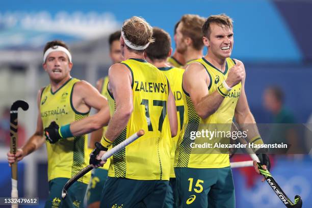 Joshua Simmonds of Team Australia celebrates their team's first goal, scored by teammate Tom Joseph Wickham during the Men's Gold Medal match between...