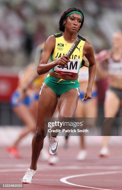 Stacey Ann Williams of Team Jamaica competes in the Women's 4 x 400m Relay heats on day thirteen of the Tokyo 2020 Olympic Games at Olympic Stadium...