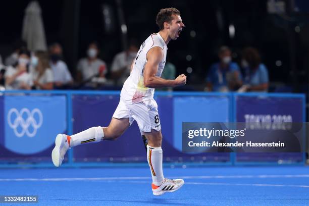 Florent van Aubel of Team Belgium celebrates scoring their team's first penalty in the penalty shootout past Andrew Lewis Charter of Team Australia...