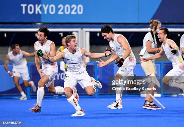 The Belgian players celebrate victory after winning the gold medal final match between Australia and Belgium on day thirteen of the Tokyo 2020...