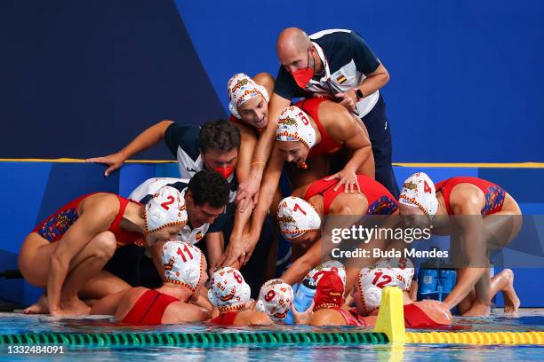 Team Spain during the Women's Semifinal match between Spain and Hungary on day thirteen of the Tokyo 2020 Olympic Games at Tatsumi Water Polo Centre...