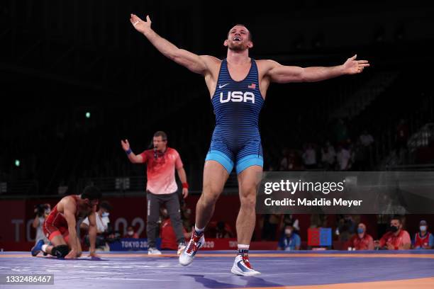 David Morris Taylor III of Team United States celebrates his victory over Hassan Yazdanicharati of Team Iran during the Men's Freestyle 86kg Final on...