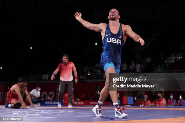 David Morris Taylor III of Team United States celebrates his victory over Hassan Yazdanicharati of Team Iran during the Men's Freestyle 86kg Final on...