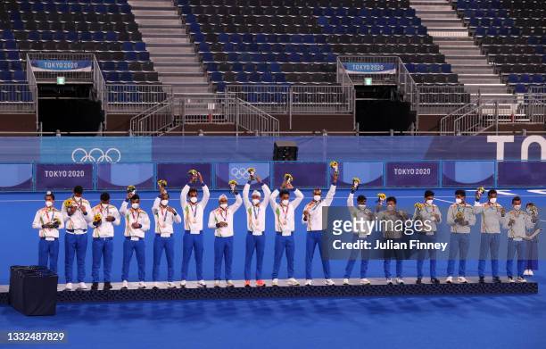Team India celebrate after being presented with their Bronze Medals during the Victory Ceremony following the Men's Gold Medal match between...