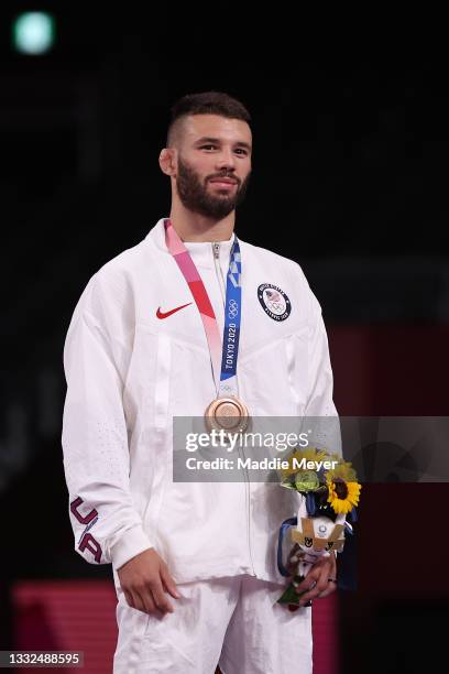 Men's Freestyle 57kg bronze medalist Thomas Patrick Gilman of Team United States stands in the podium with his medal during the Victory Ceremony on...