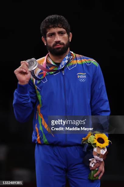 Men's Freestyle 57kg silver medalist Kumar Ravi of Team India poses with his medal during the Victory Ceremony on day thirteen of the Tokyo 2020...