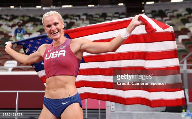 Katie Nageotte of Team USA celebrates after winning the gold medal in the Women's Pole Vault Final on day thirteen of the Tokyo 2020 Olympic Games at...