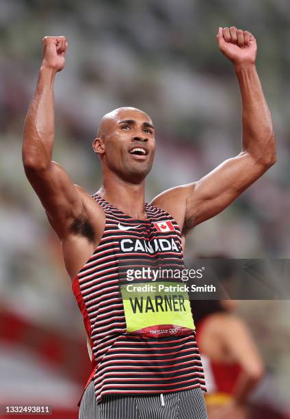 Damian Warner of Team Canada looks on as he awaits the results of the Men's Decathlon on day thirteen of the Tokyo 2020 Olympic Games at Olympic...
