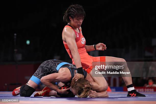 Risako Kawai of Team Japan competes against Iryna Kurachkina of Team Belarus during the Women's Freestyle 57kg Final on day thirteen of the Tokyo...