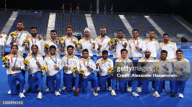 Team India celebrate with their Bronze Medals during the Victory Ceremony following the Men's Gold Medal match between Australia and Belgium on day...
