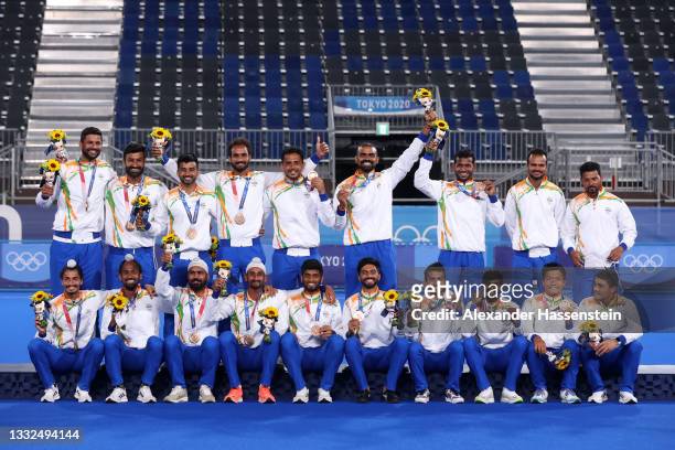 Team India celebrate with their Bronze Medals during the Victory Ceremony following the Men's Gold Medal match between Australia and Belgium on day...