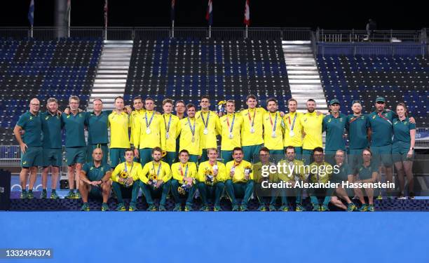 Team Australia pose after being presented with their Silver Medals during the Victory Ceremony following the Men's Gold Medal match between Australia...