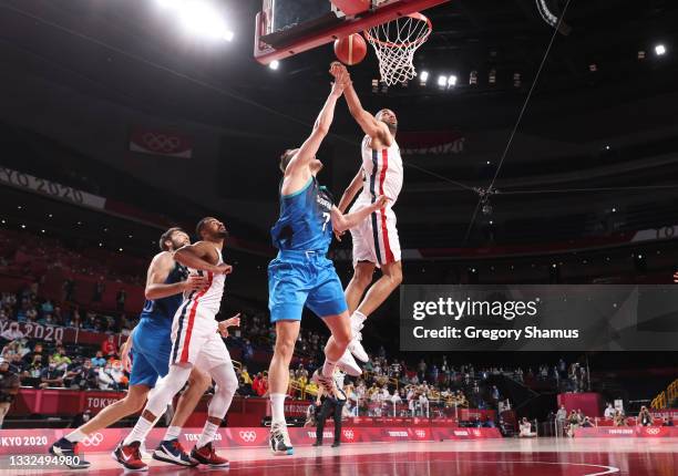 Nicolas Batum of Team France blocks the shot of Klemen Prepelic of Team Slovenia to win the game during the second half of a Men's Basketball...
