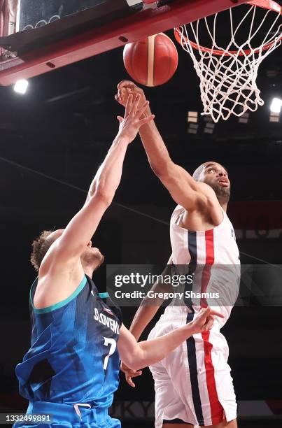 Nicolas Batum of Team France blocks the shot of Klemen Prepelic of Team Slovenia to win the game during the second half of a Men's Basketball...