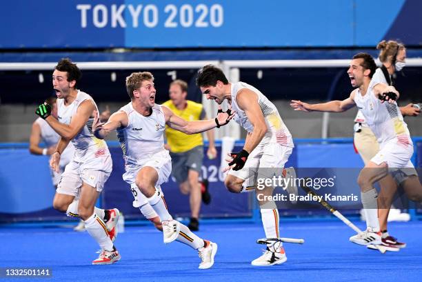 The Team Belgium players celebrate victory after the gold medal final match between Australia and Belgium on day thirteen of the Tokyo 2020 Olympic...