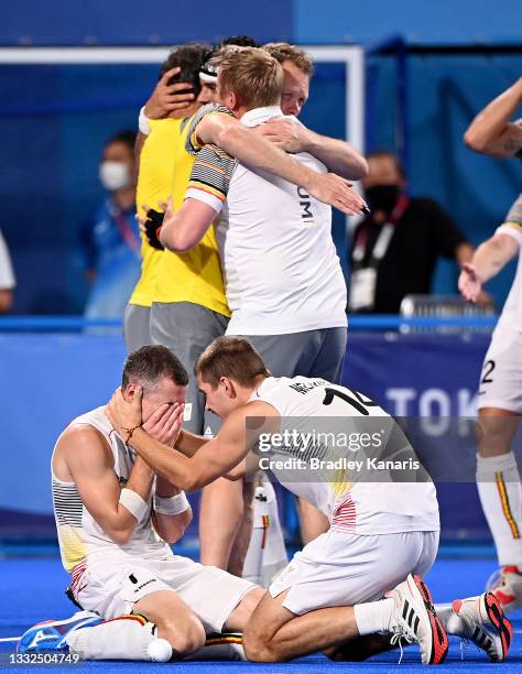 The Belgian players celebrate victory after the gold medal final match between Australia and Belgium on day thirteen of the Tokyo 2020 Olympic Games...