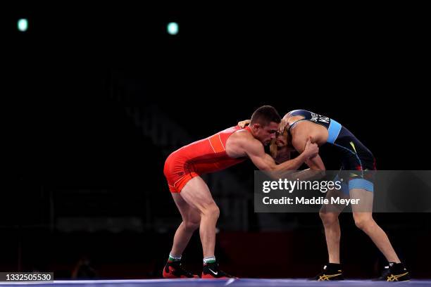 Nurislam Sanayev of Team Kazakhstan competes against Georgi Valentinov Vangelov of Team Bulgaria during the Men's Freestyle 57kg Bronze Medal Match...