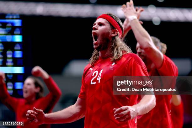 Mikkel Hansen of Team Denmark celebrates after winning the Men's Semifinal handball match between Spain and Denmark on day thirteen of the Tokyo 2020...